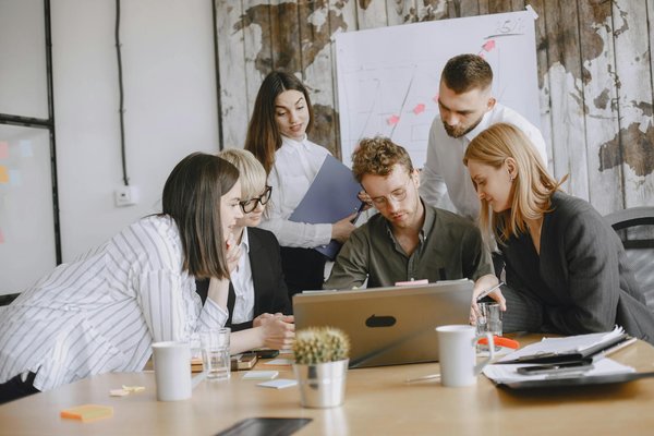 What strategies can UK businesses adopt to attract top talent?